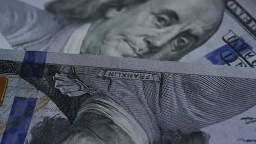 Rotating stock footage shot of $100 bills - MONEY 0140