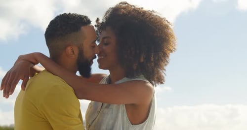 Couple embracing each other at beach 4k