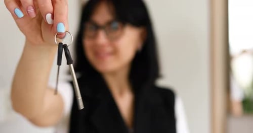 Real Estate Agent Woman Giving Keys to Customer After Selling Modern Apartment