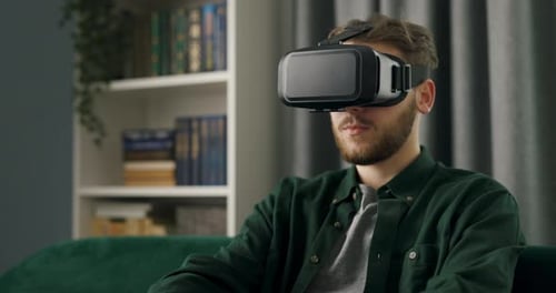 Man Experiencing Virtual Reality at Home