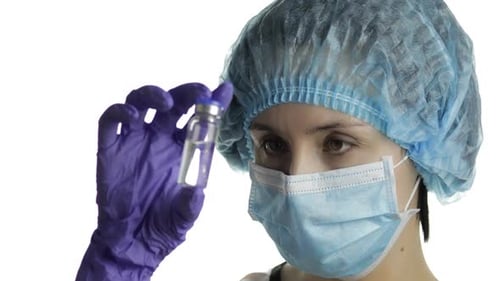 Female Scientist Holding Ampoule in Hand, New Medication Developing, Vaccination