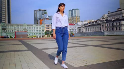 Young Beautiful Business Woman on City Street
