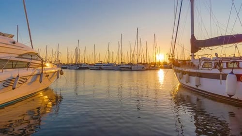 Time Lapse. Sunset Scene at Marina with Yachts Tied To the Docks, Sun and Sky Beautiful Color