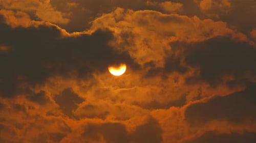 Beautiful Orange Sun with Clouds at Sunrise
