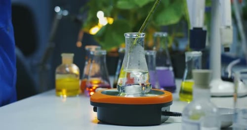 Adding Chemical to Flask in Science Lab