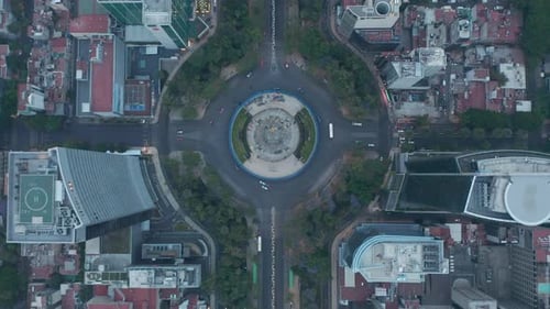 Overhead Top Down Aerial View of Roundabout Around The Angel of Independence Monument in Urban City