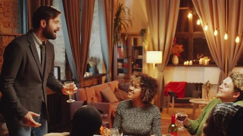 Friends Gather for Dinner Party and Toast