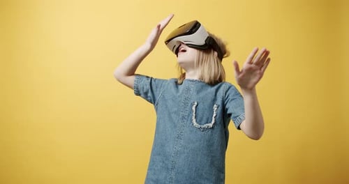 Girl Using Virtual Reality Headset Having Fun