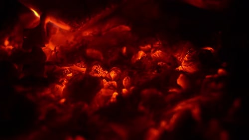 Glowing Embers and Bright Orange Flames
