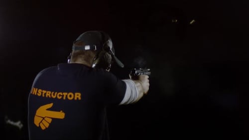 Instructor firing with an automatic gun, Ultra Slow Motion