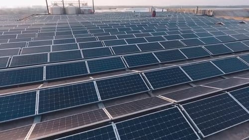 Solar panels photovoltaic system. Aerial of photovoltaic power plant on roof