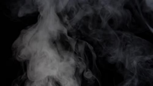 Abstract White Smoke Billowing on Black Background