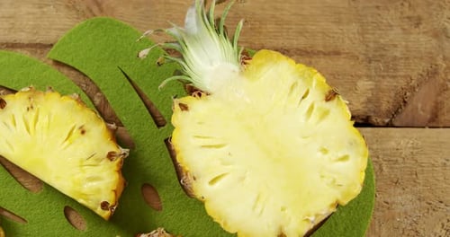 Close Up of Sliced Pineapple on Wood