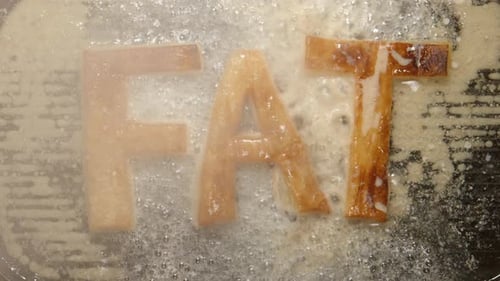 FAT letters fry in oil in a pan - steam and boils
