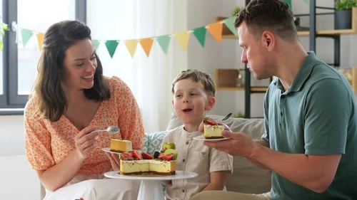Happy Family Celebrating a Birthday with Cake