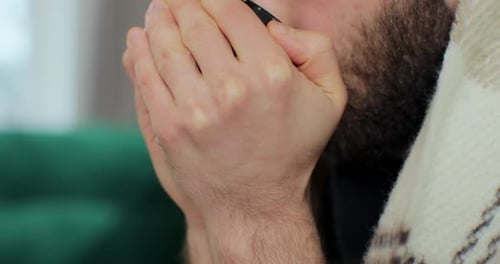 Close Up Sick Man Wearing Blanket Warming Up with Hot Tea Recovering Disease Virus Infection Staying