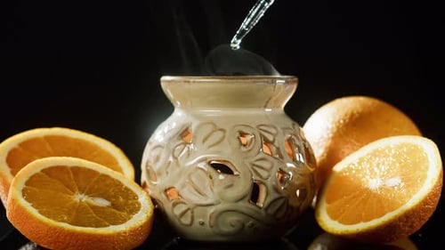 Dripping Serum Into Candle Holder Closeup