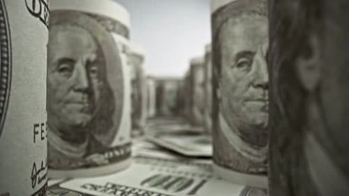 American one hundred dollar paper banknote in close up macro view dolly shot.
