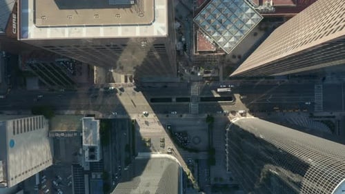 AERIAL: Slow Lowering Birds Eye View Flight Over Downtown Los Angeles California Grand Avenue in