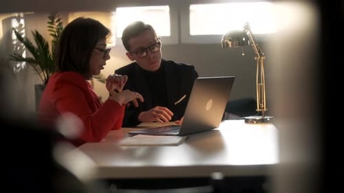 In Creative Office Productive Coworkers Standing at the Table, Company Meeting. Businessman And