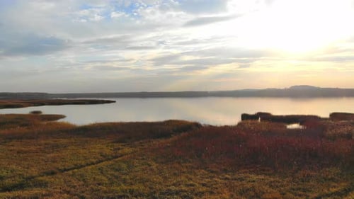 Romantic sunset by the lake.