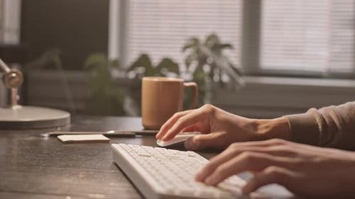 Male Hands Typing on Keyboard