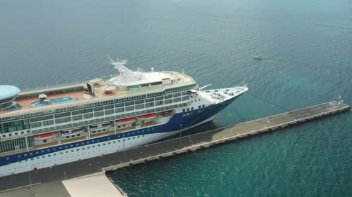 Touristic Ocean Liner Ready for Voyage Moored to Long Pier