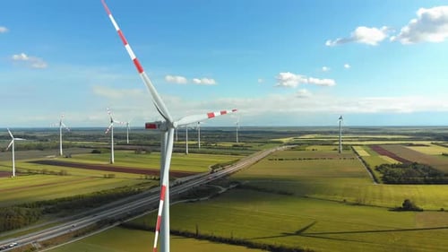 Aerial View of Wind Turbines Farm in Field. Austria. Drone View on Energy Production
