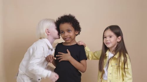 Children Sharing a Secret, Indoor Studio Shot