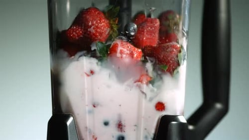 Blending Fresh Fruit for a Delicious Berry Smoothie