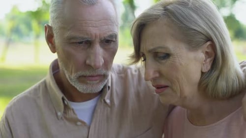 Old Woman Crying After Horrible News of Cancer, Supportive Husband
