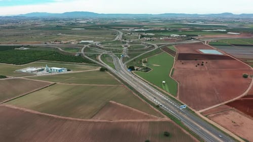Aerial View. Road Traffic Highway and Overpass with Cars and Trucks, Interchange, Two-level Road