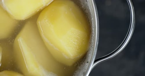 Potatoes Boiled in Pot of Water.