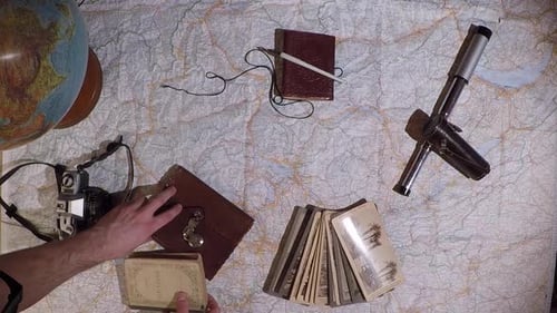 Travel Planning with Globe, Map and Vintage Camera
