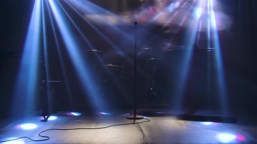 Stage with Microphone, Drum Set, and Lighting