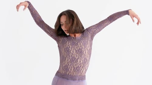 Woman Performing Contemporary Dance in Studio