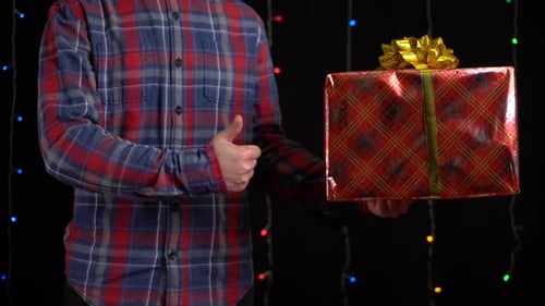 Unrecognizable Person Holding Christmas Gift Box