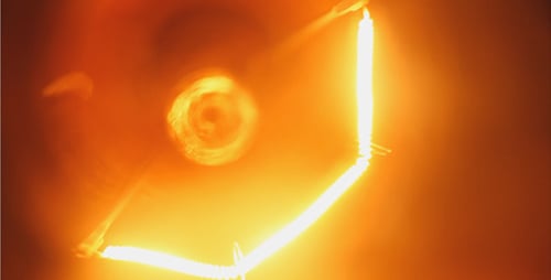 Macro Shot of a Glowing Light Bulb Filament