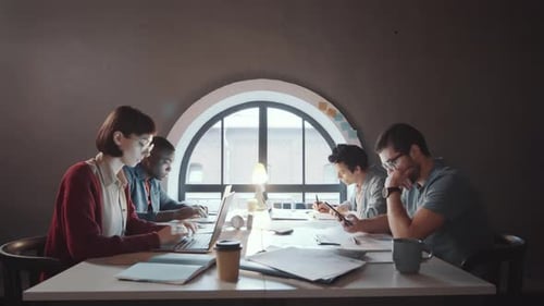 Team Working Together in an Urban Office Setting