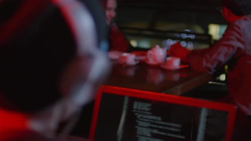 Freelance Programmer Coding in Restaurant