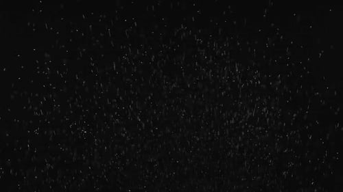 Water Droplets Falling on a Black Background