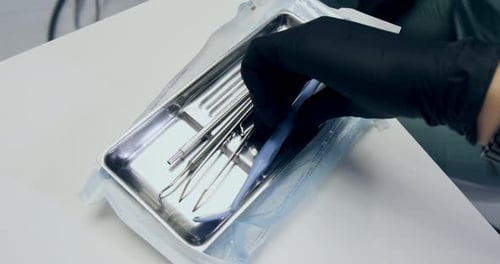 Dental Tools on Metal Tray in Clinic