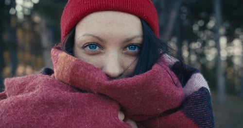 Young Woman In A Scarf In A Pine Forest
