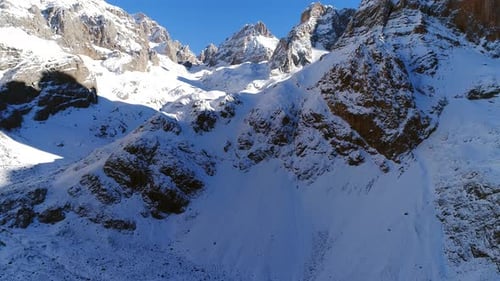 Majestic Snow Capped Mountains Aerial View in Winter