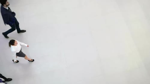 Businesspeople walking in office