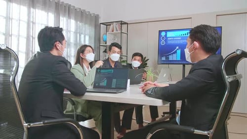 Team Meeting with Masks at Office Workplace
