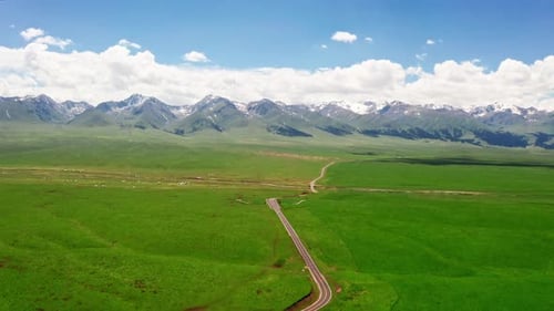 Mountains and grassland in a sunny day