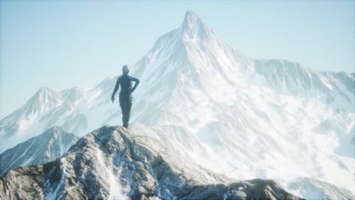 Woman Standing In Snow Wearing Warm Clothes In Mountains