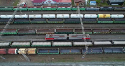 Aerial View of Train Yard Full of Cars