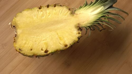 Pineapple Half on Wooden Surface
